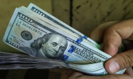 أسعار صرف الدولار تسجل تراجعاً في بغداد وأربيل